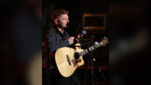 Jordan O Keefe playing guitar live