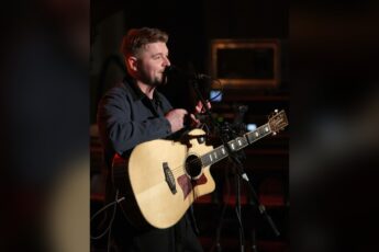Jordan O Keefe playing guitar live