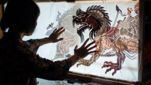 Shadow puppetry art on a lit screen