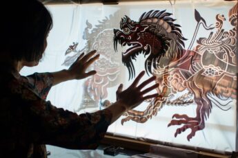 Shadow puppetry art on a lit screen